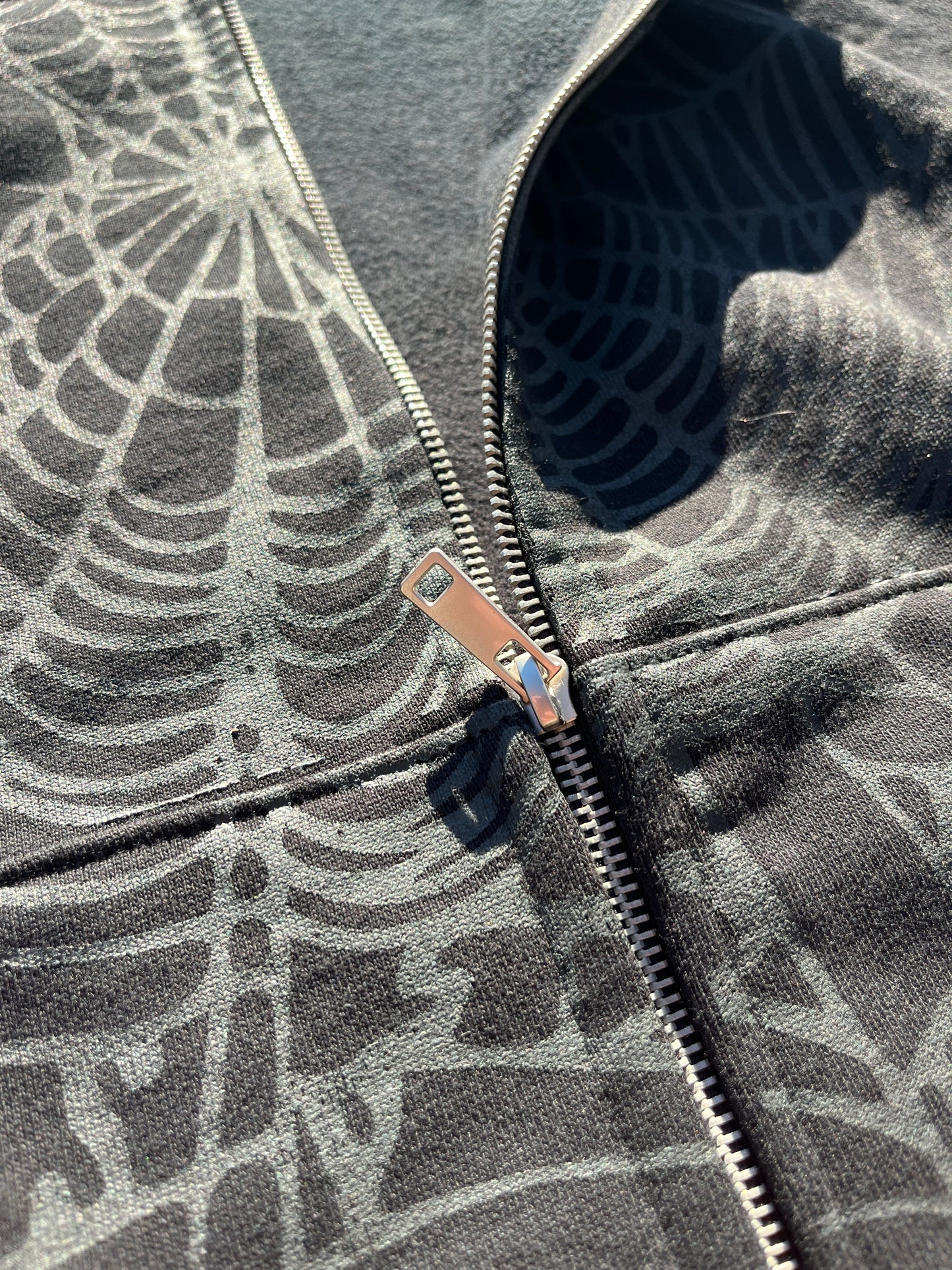 Black Gem zip up spider