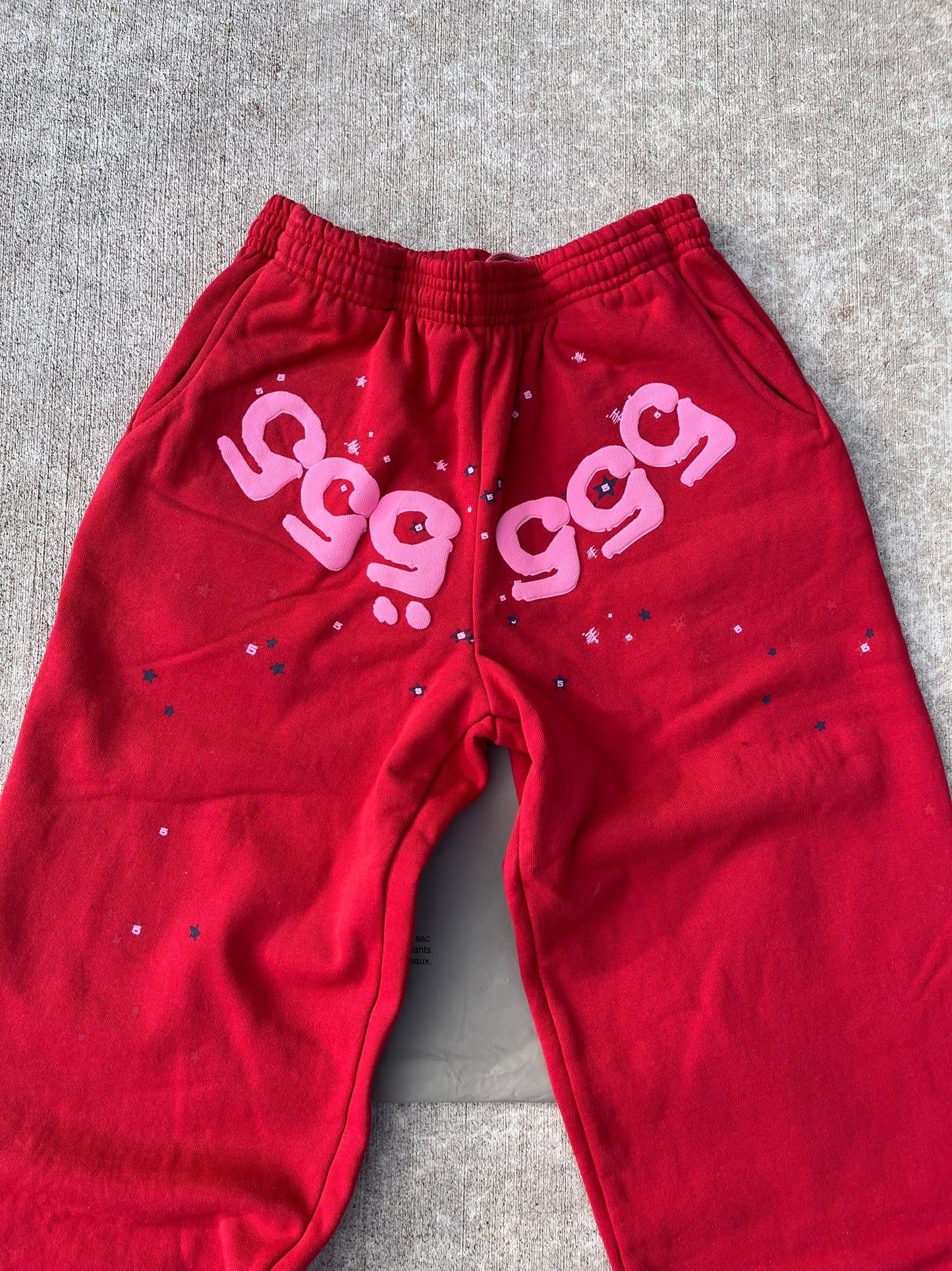 red 555 pants