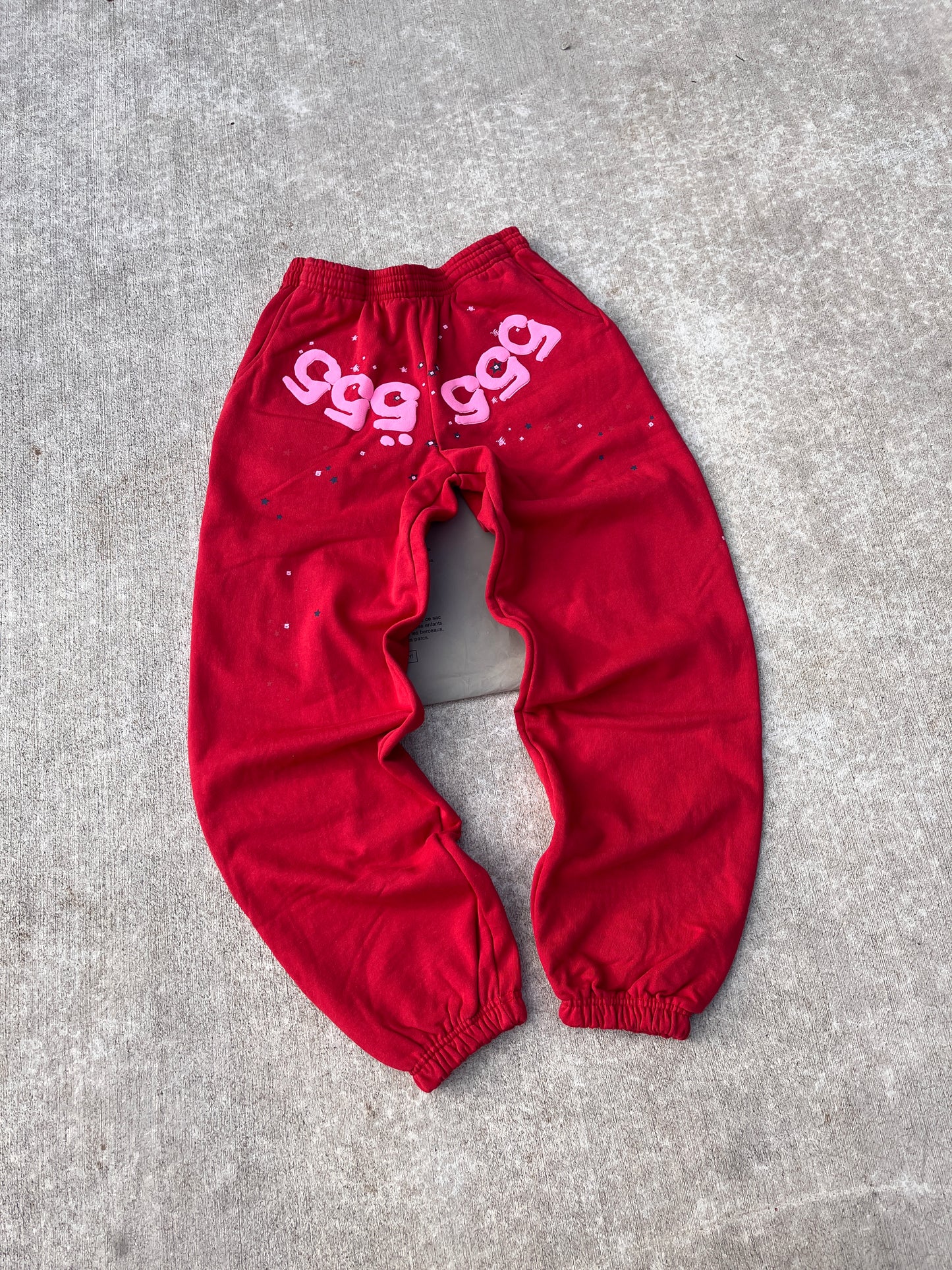 red 555 pants